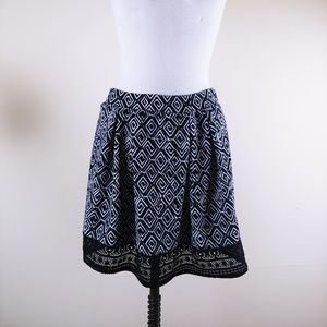 Joe B. Black and white patterned skirt